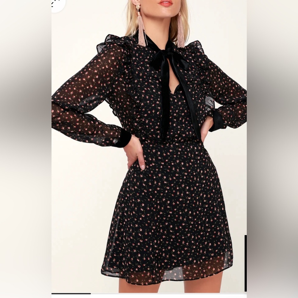 Black floral print mini dress with trim detail. Only worn once!!